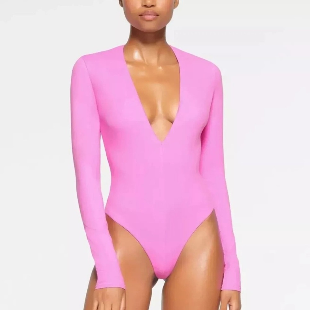 SKIMS Long Sleeve Deep V-Neck Bodysuit in Pink